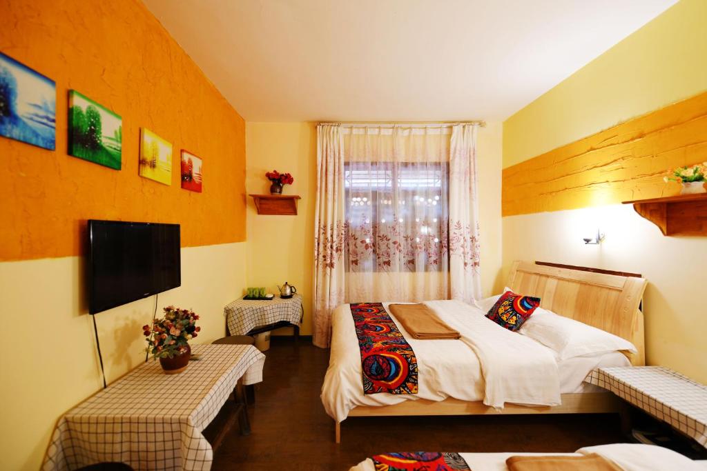 Postel nebo postele na pokoji v ubytování Maple Leaf Inn