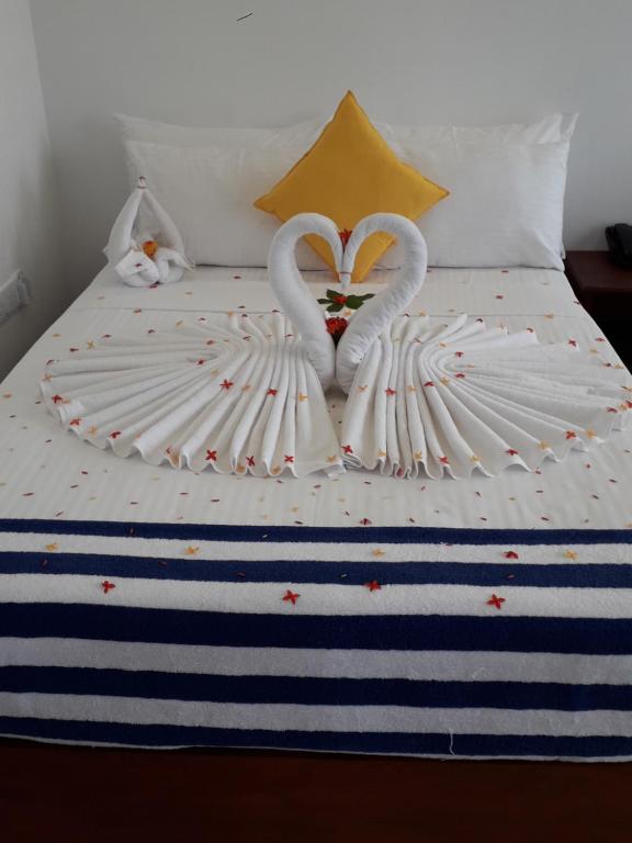 Postel nebo postele na pokoji v ubytování J7 Villaj Resort