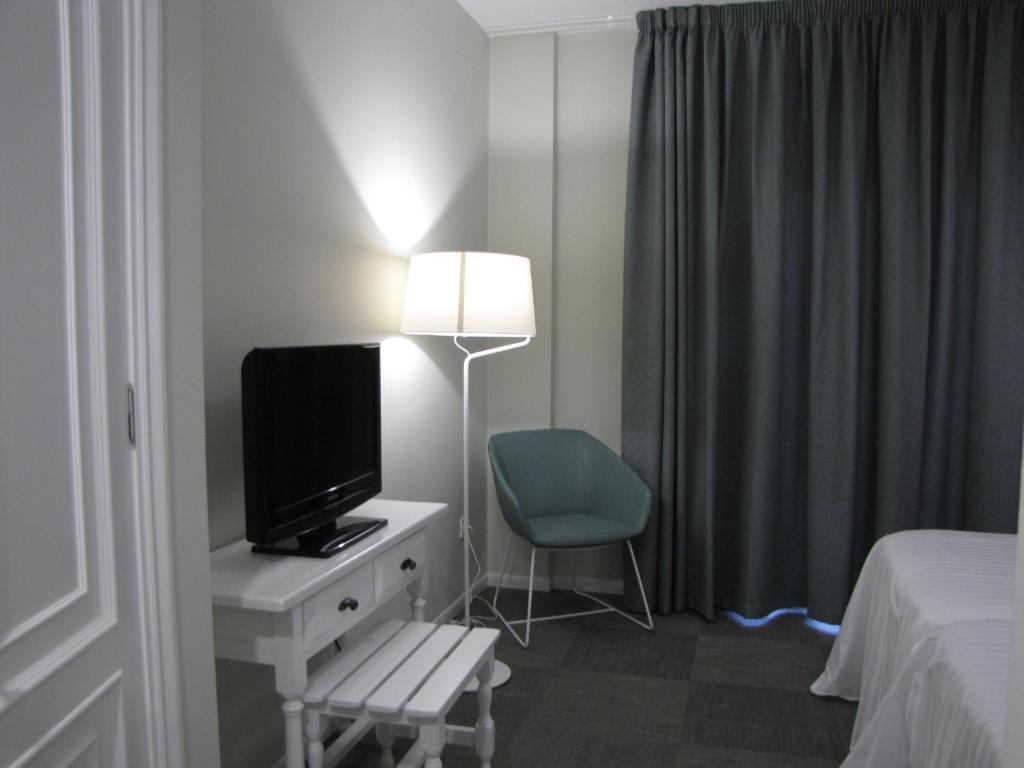 TV a/nebo společenská místnost v ubytování Hotel Ton