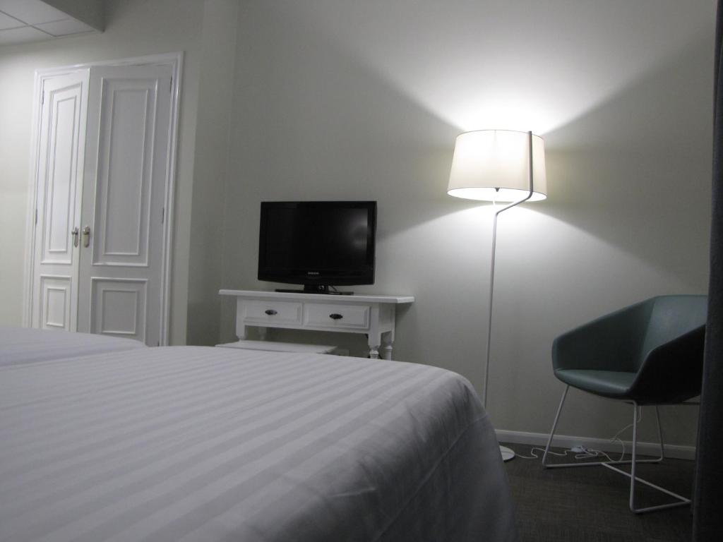 TV a/nebo společenská místnost v ubytování Hotel Ton