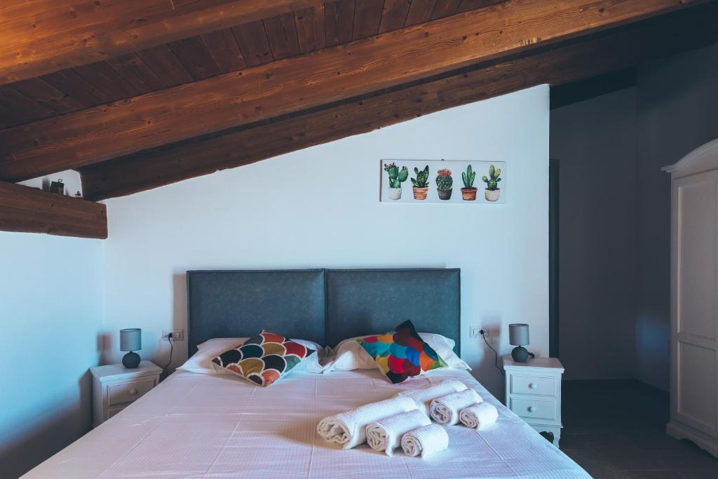 Postel nebo postele na pokoji v ubytování Antica Villa Colonica