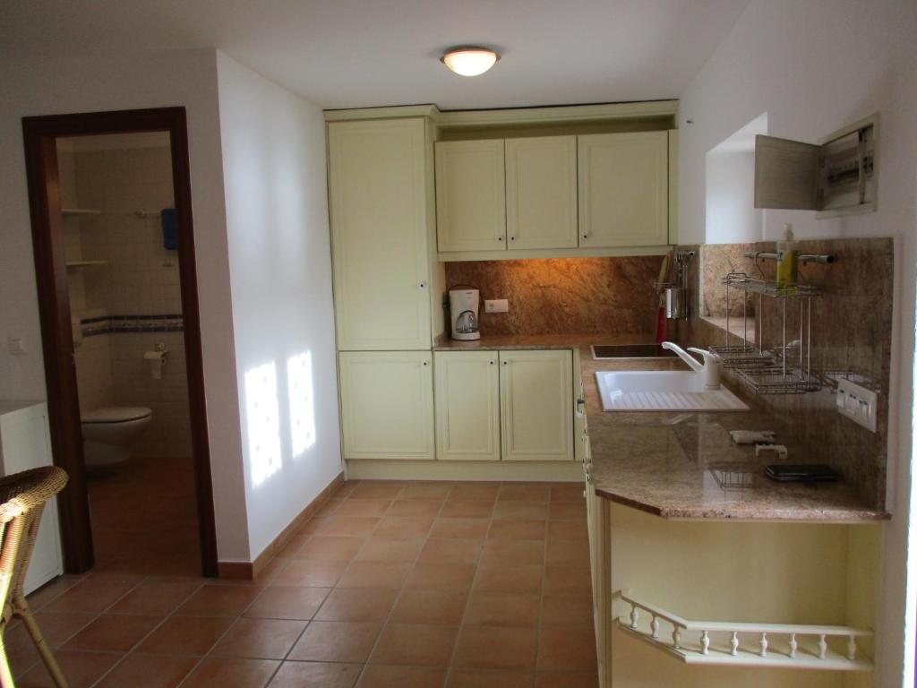 Kuchyň nebo kuchyňský kout v ubytování 1. Meeresline Villa mit privat Pool