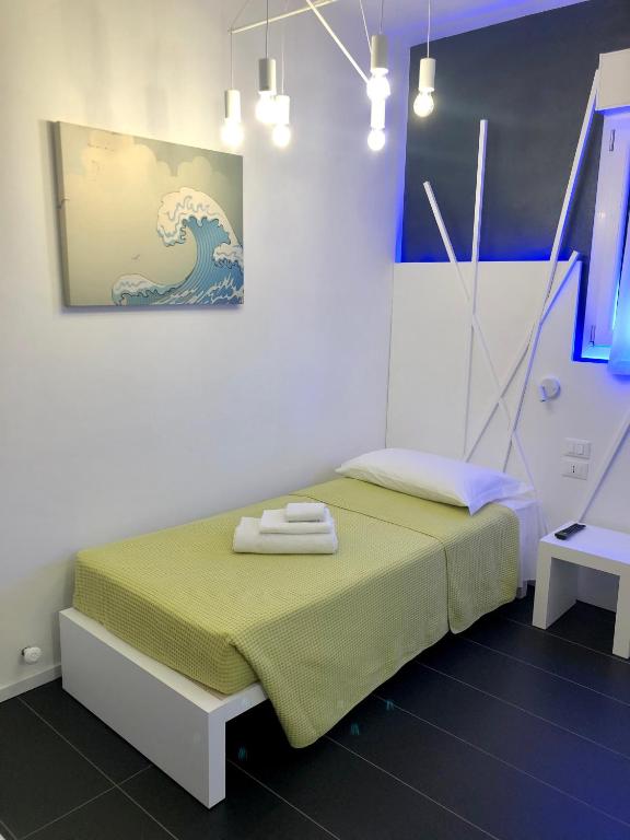 Postel nebo postele na pokoji v ubytování Sunrise Rooms