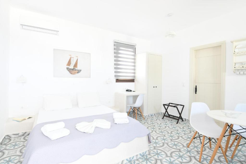 Postel nebo postele na pokoji v ubytování Hotel Castillio