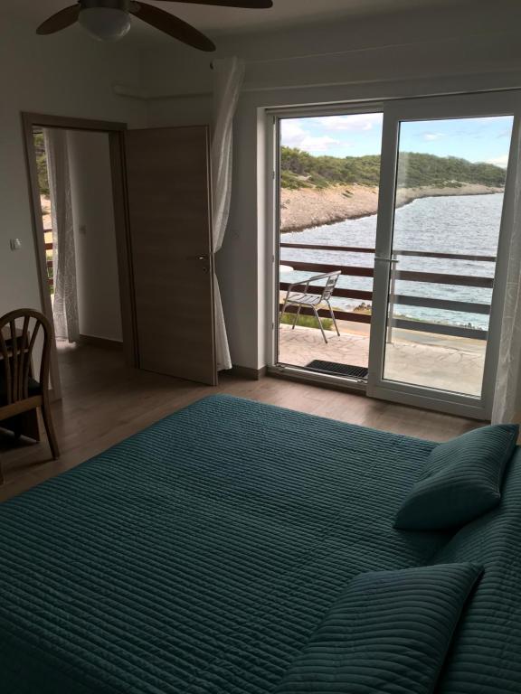 Postel nebo postele na pokoji v ubytování Apartment Marika
