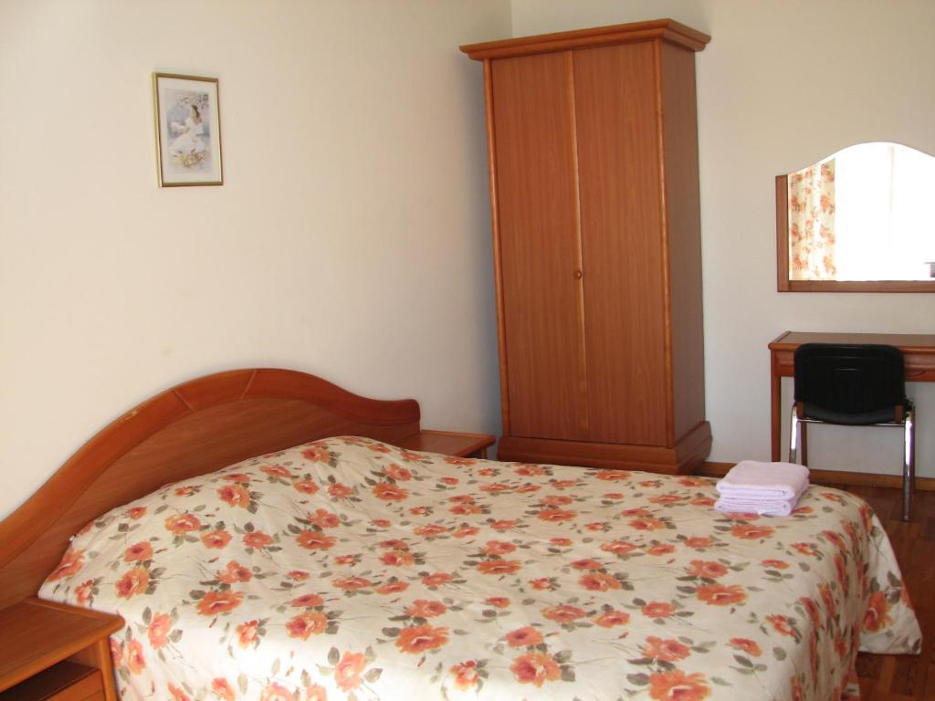 Postel nebo postele na pokoji v ubytování Little Amber Apartments