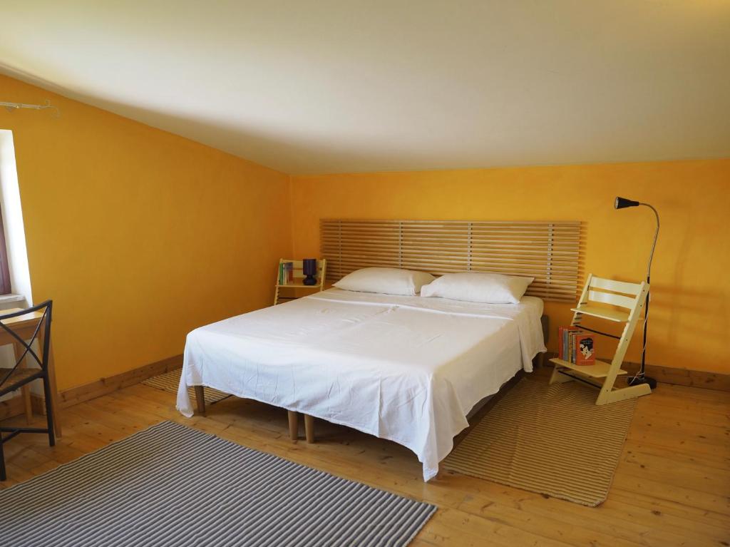 Postel nebo postele na pokoji v ubytování Chez Raz B&B