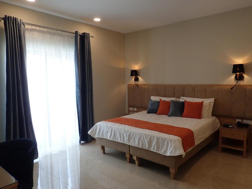 Postel nebo postele na pokoji v ubytování Duncan Guesthouse