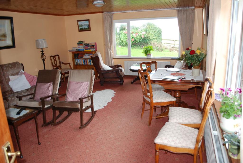 Posezení v ubytování Dromcloc House
