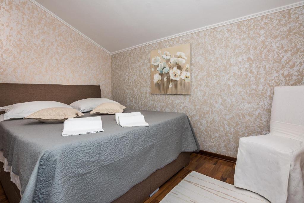 Postel nebo postele na pokoji v ubytování Apartments Medanić - Private Pool