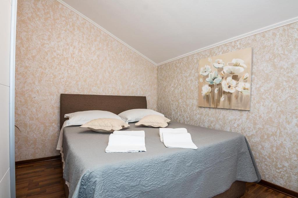 Postel nebo postele na pokoji v ubytování Apartments Medanić - Private Pool