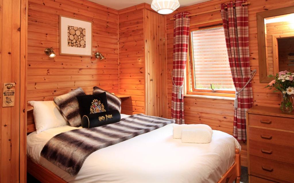 Postel nebo postele na pokoji v ubytování Reuben's Highland Retreat - Arisaig