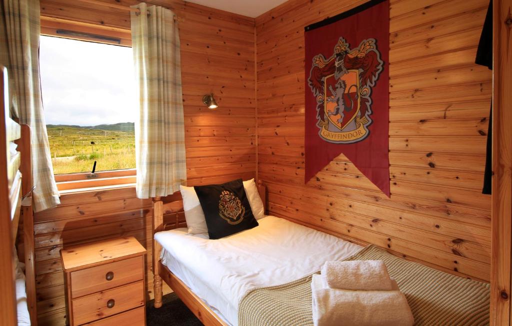 Postel nebo postele na pokoji v ubytování Reuben's Highland Retreat - Arisaig