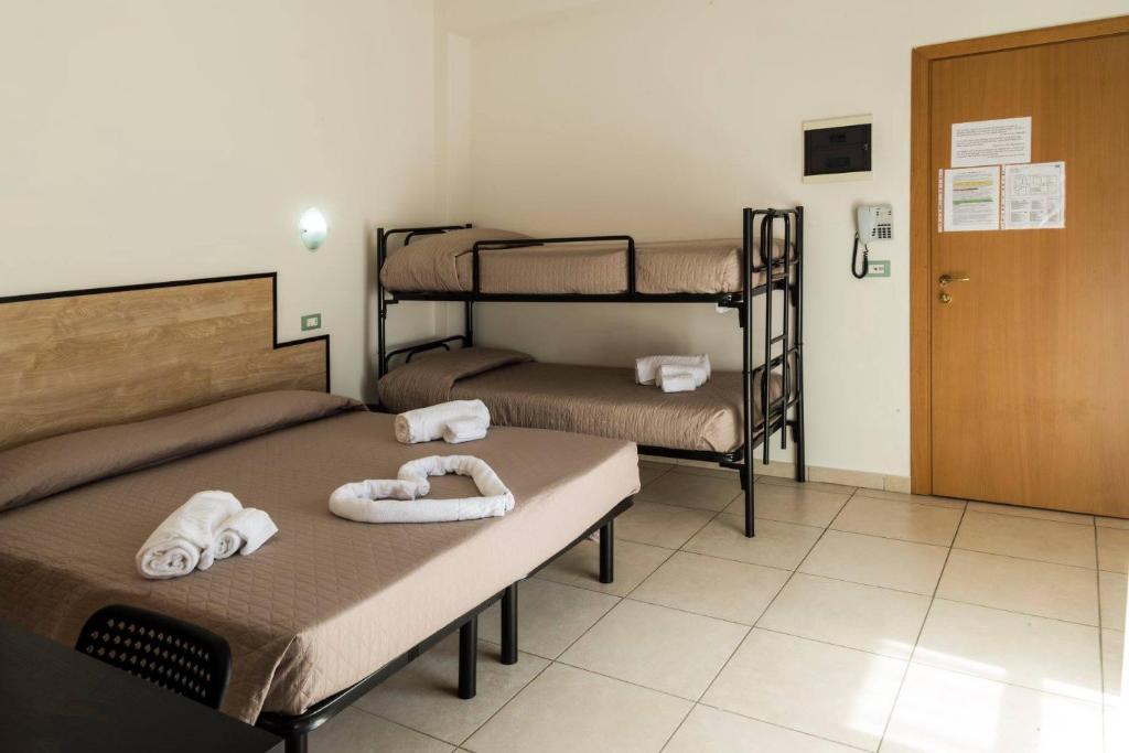 Postel nebo postele na pokoji v ubytování My Hotel Cesenatico