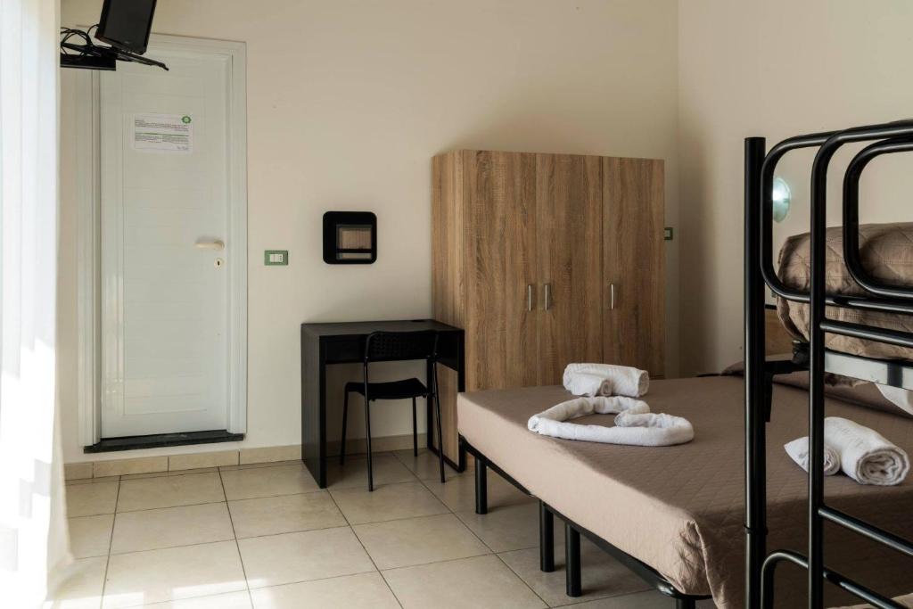 Postel nebo postele na pokoji v ubytování My Hotel Cesenatico