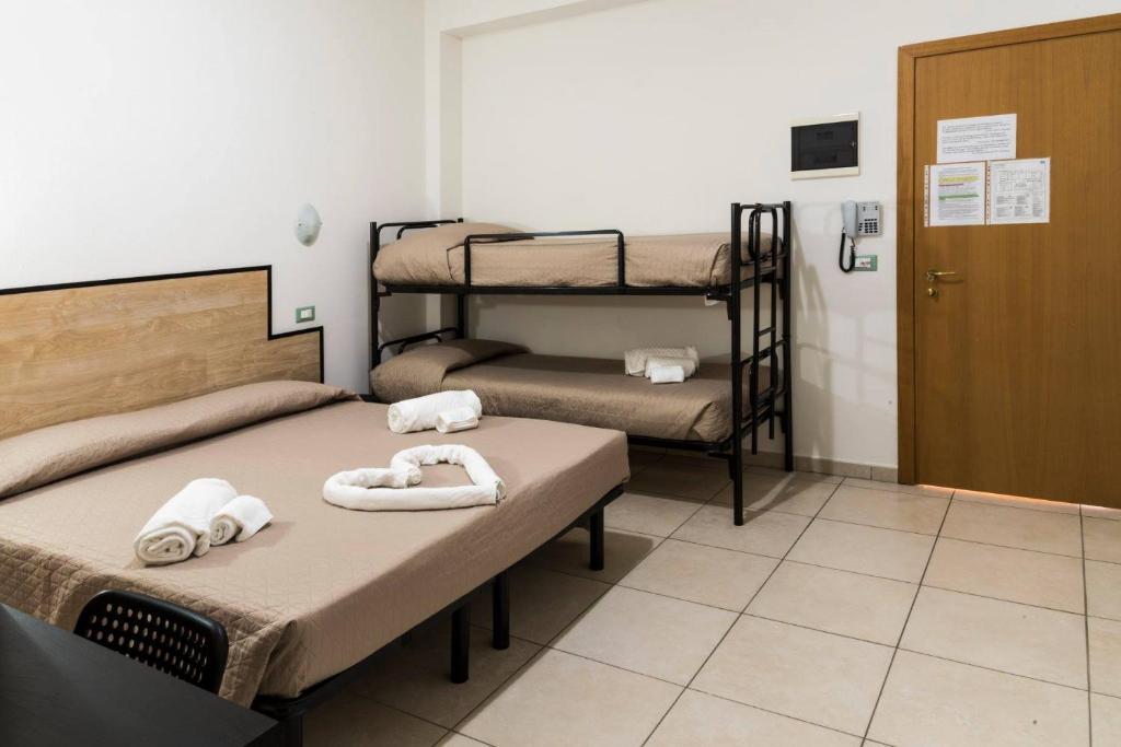 Postel nebo postele na pokoji v ubytování My Hotel Cesenatico
