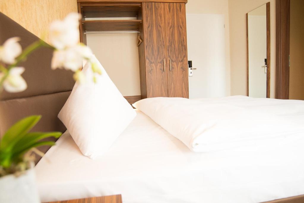 Cama o camas de una habitación en Hotel Amaris