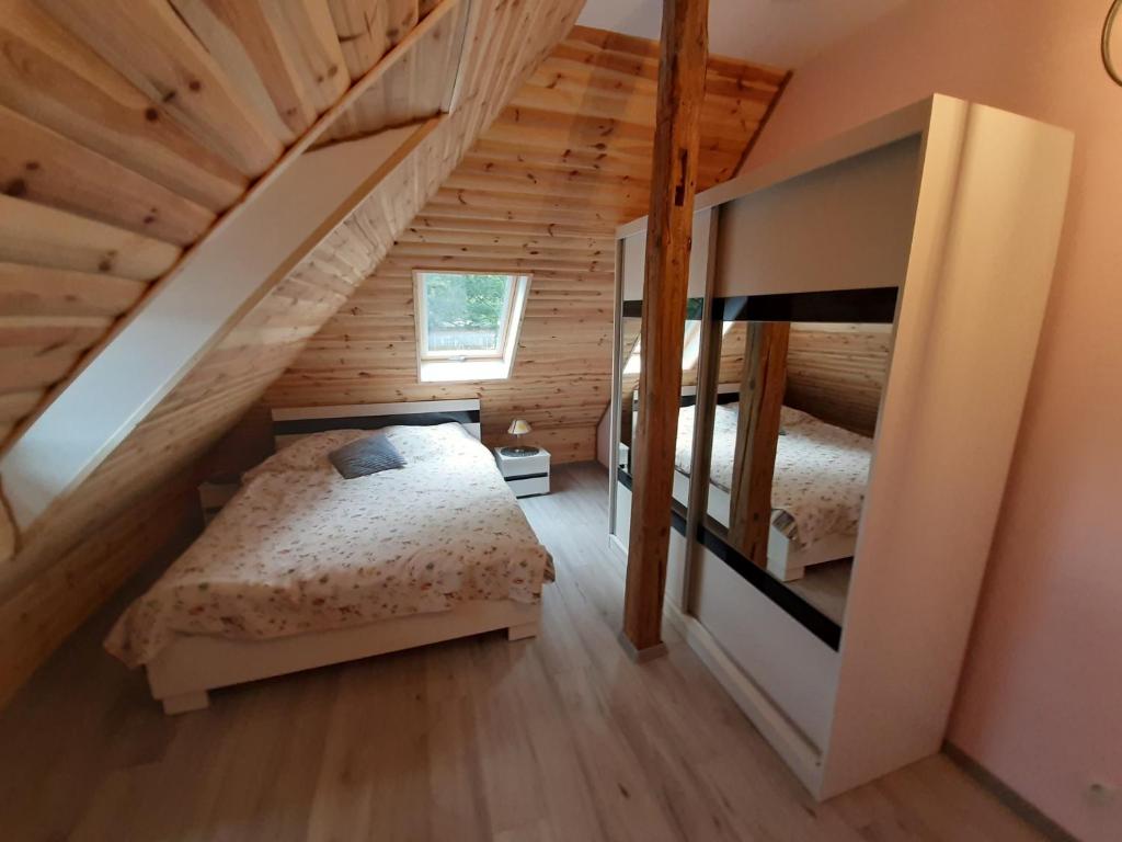 Postel nebo postele na pokoji v ubytování Apartament Górski Raj