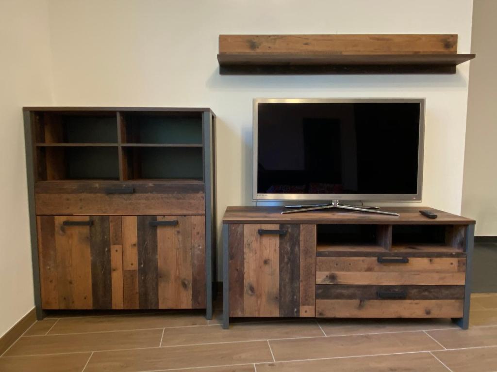 Televízia a/alebo spoločenská miestnosť v ubytovaní Ferienwohnung 90m² 2-6 Personen