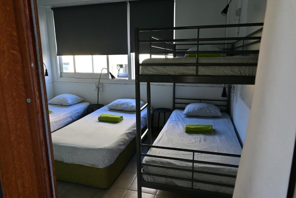 Postel nebo postele na pokoji v ubytování Lemongrass Hostel