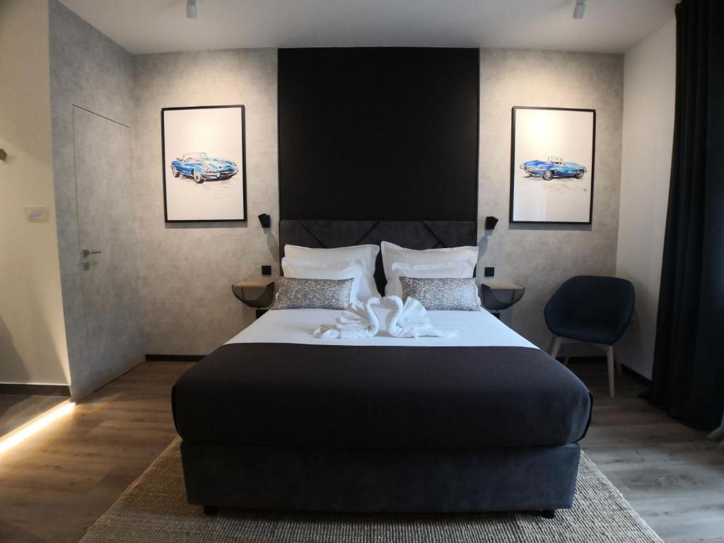 Postel nebo postele na pokoji v ubytování Scuderia Split Rooms