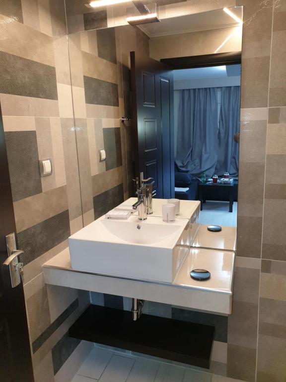 Koupelna v ubytování luxrooms