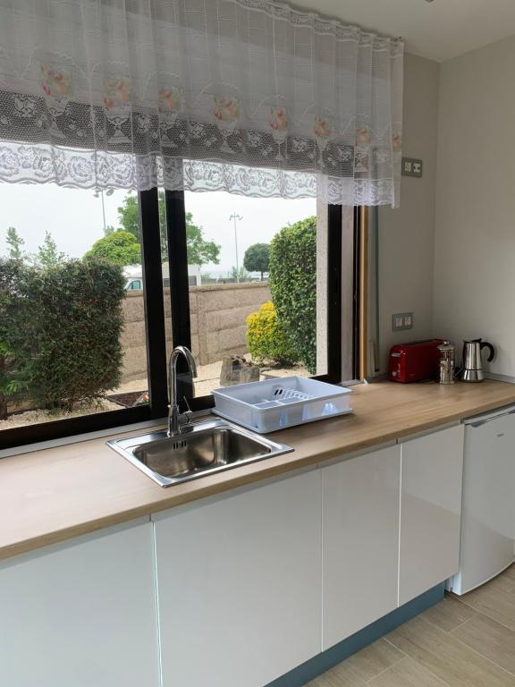 Kuchyň nebo kuchyňský kout v ubytování Casa Mavimar Playa