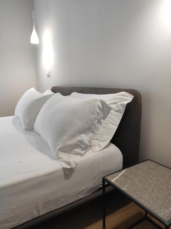 Postel nebo postele na pokoji v ubytování Borgo di Ponte Holiday Apartments & Rooms