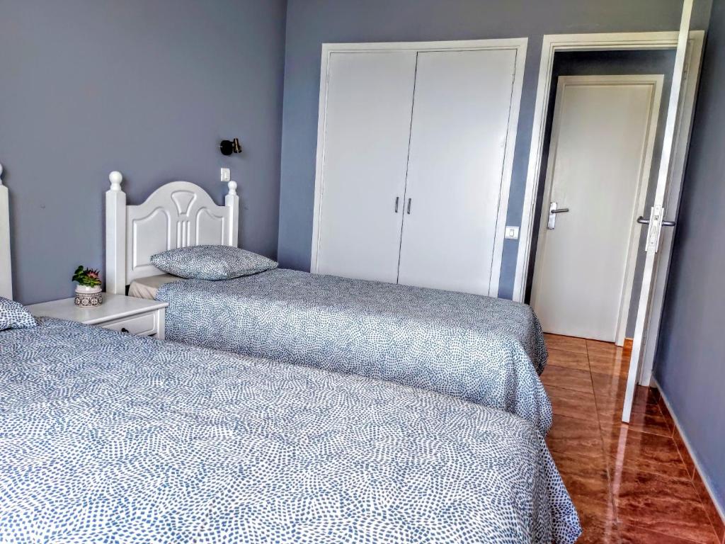 Postel nebo postele na pokoji v ubytování Sea View Apartment in Patalavaca