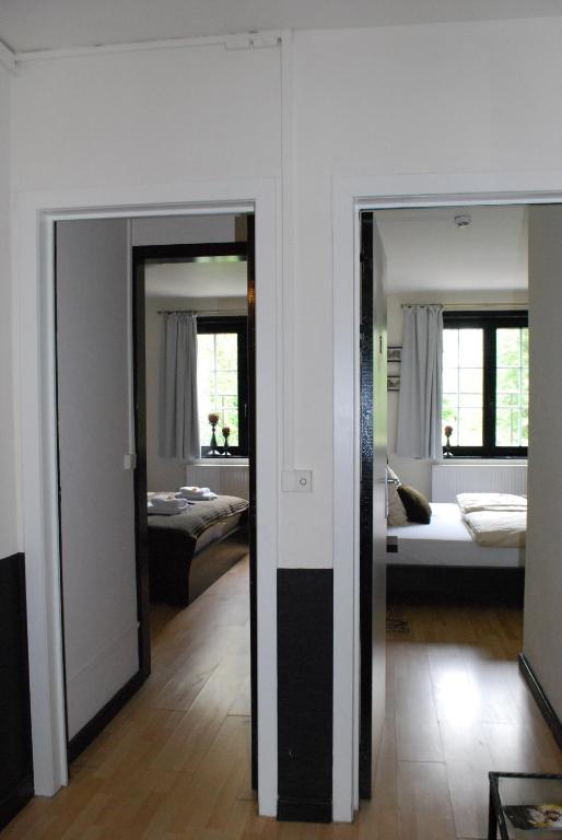 Postel nebo postele na pokoji v ubytování Hotel 'T Bagientje