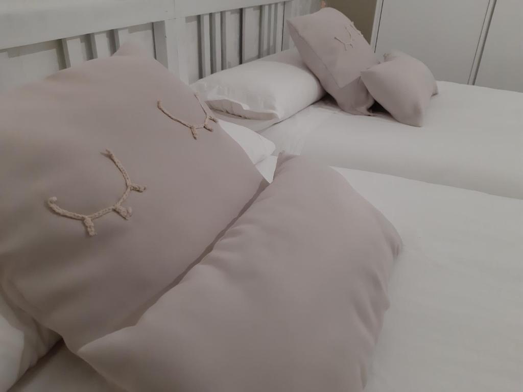 Postel nebo postele na pokoji v ubytování La Casa de Leo - El Casar de Leo
