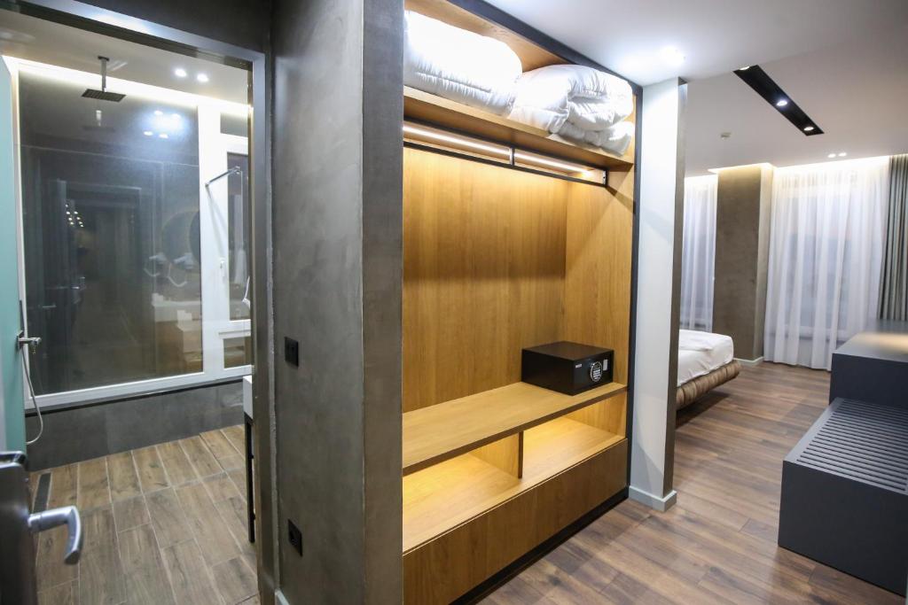 Postel nebo postele na pokoji v ubytování AP Hotel Boutique