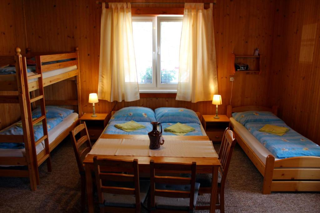 Postel nebo postele na pokoji v ubytování Chata Horec