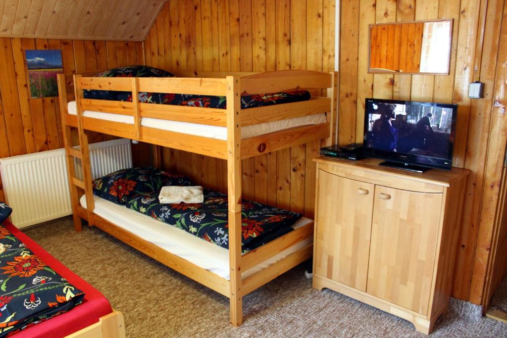 Palanda nebo palandy na pokoji v ubytování Chata Horec