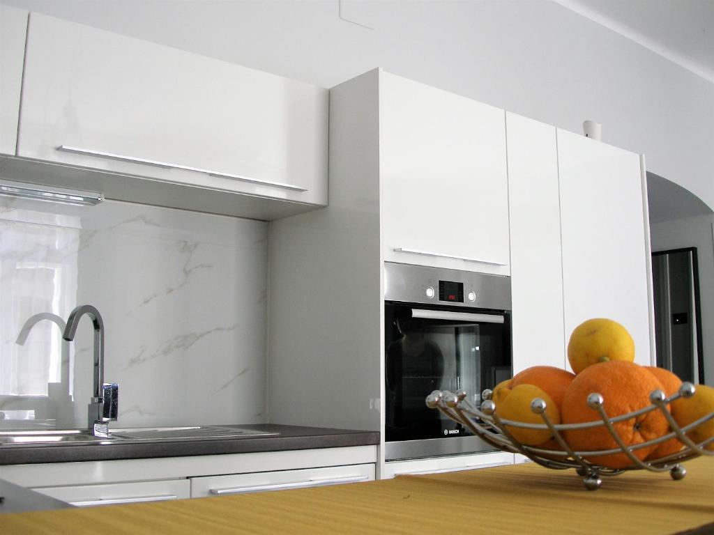 Kuchyň nebo kuchyňský kout v ubytování Apartman Neverin
