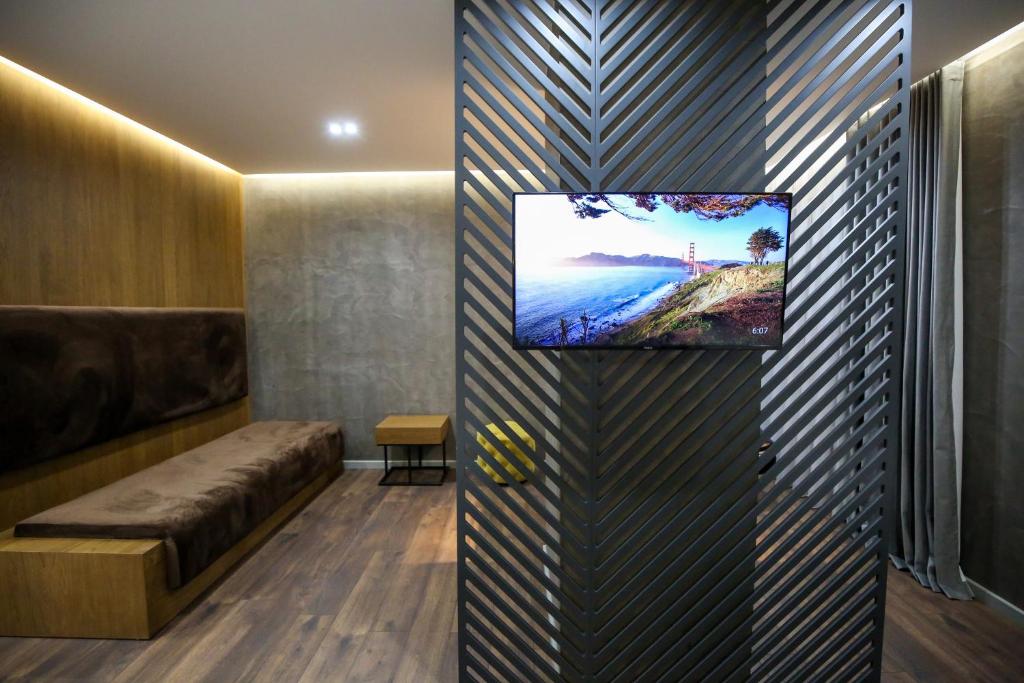 TV a/nebo společenská místnost v ubytování AP Hotel Boutique