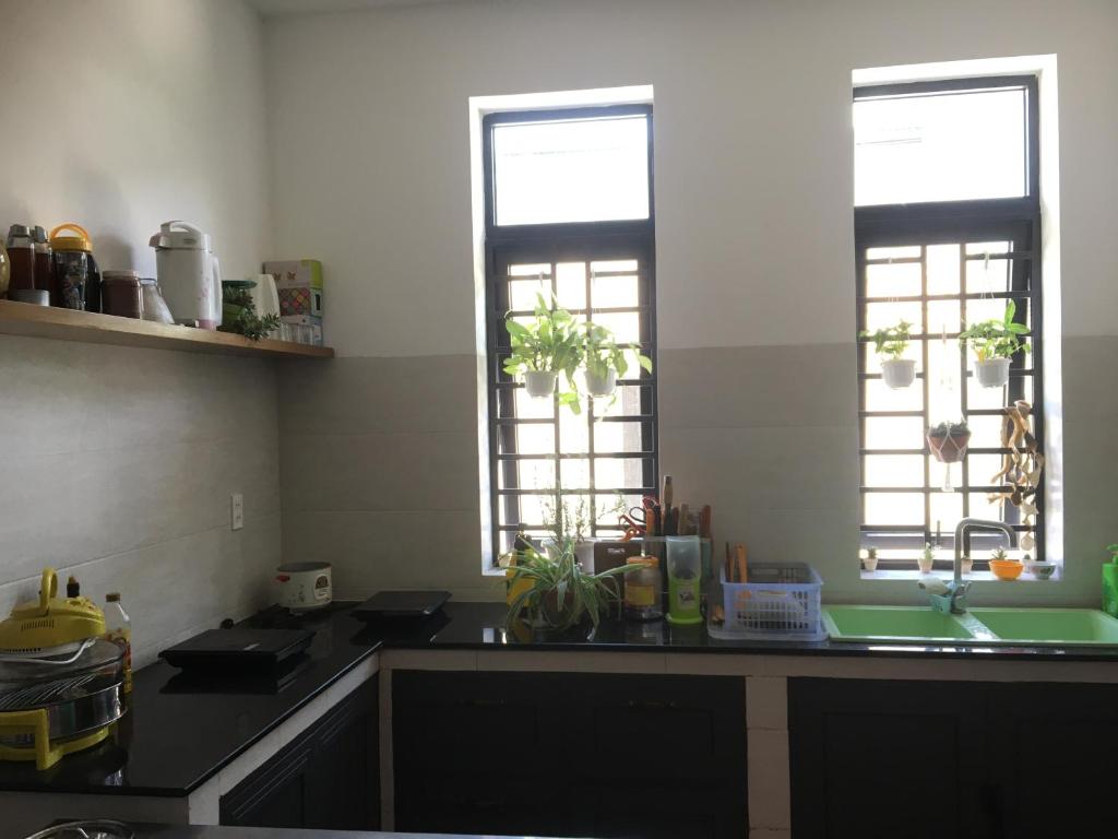 Kuchyň nebo kuchyňský kout v ubytování Ken King 2 - homestay gần biển giá rẻ