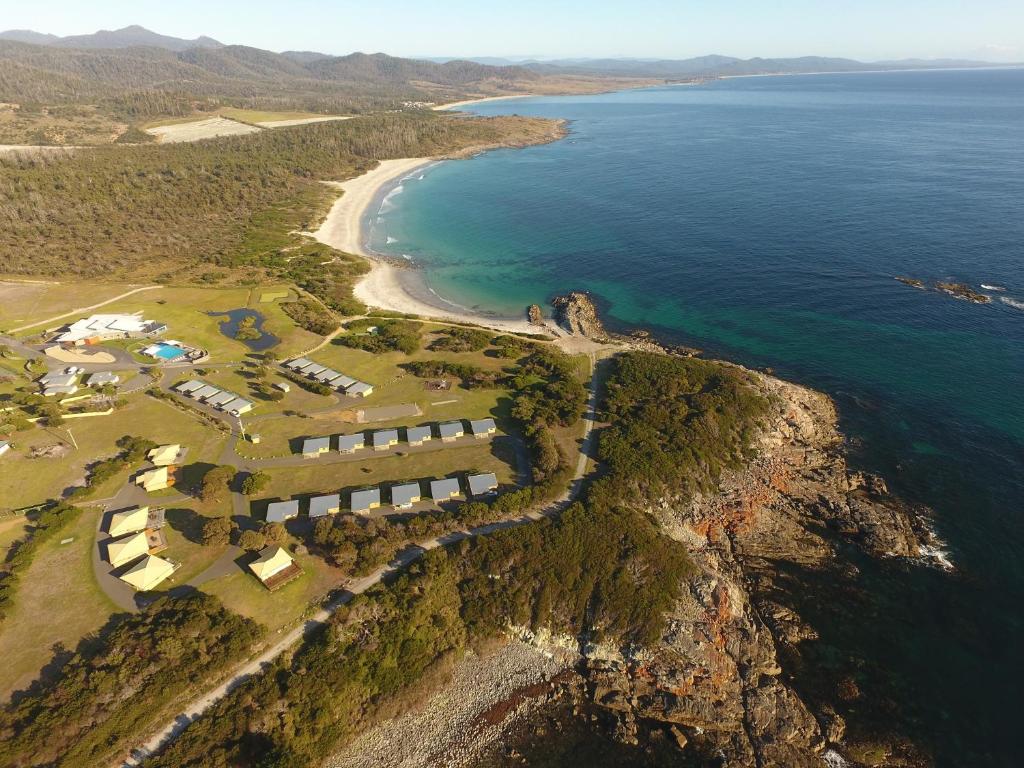 an aerial view of a beach and the ocean at White Sands Estate in Falmouth