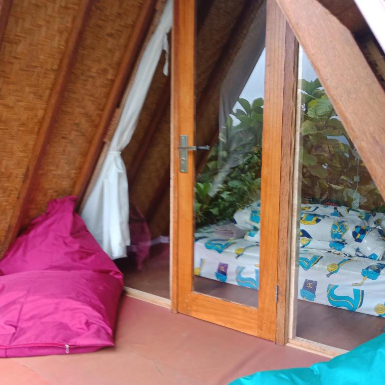 Postel nebo postele na pokoji v ubytování ECO Bedugul adventurer camp