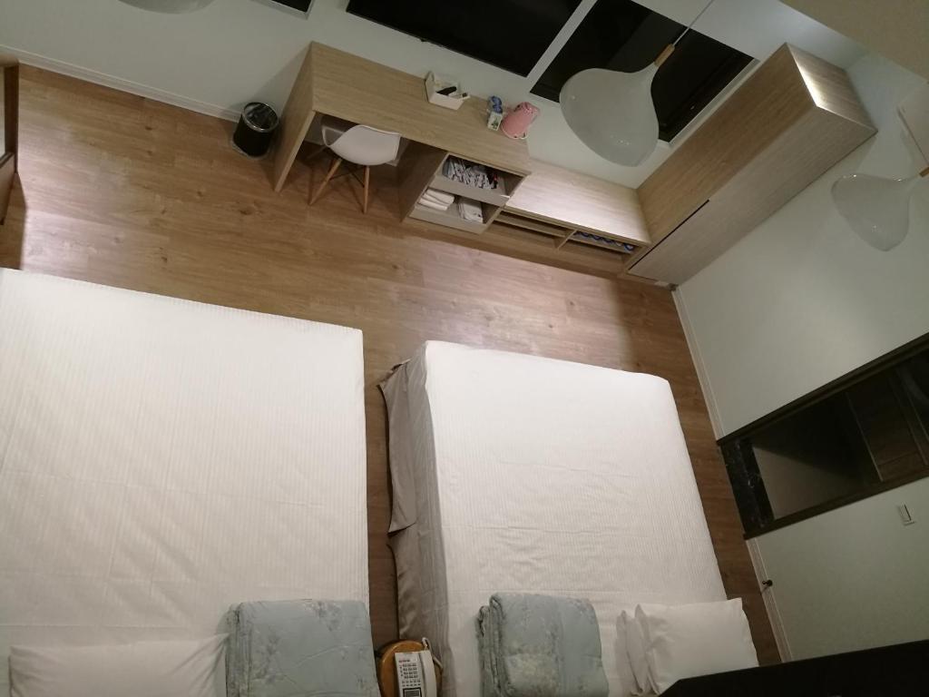 TV a/nebo společenská místnost v ubytování 名竹旅社 Minzu Hotel