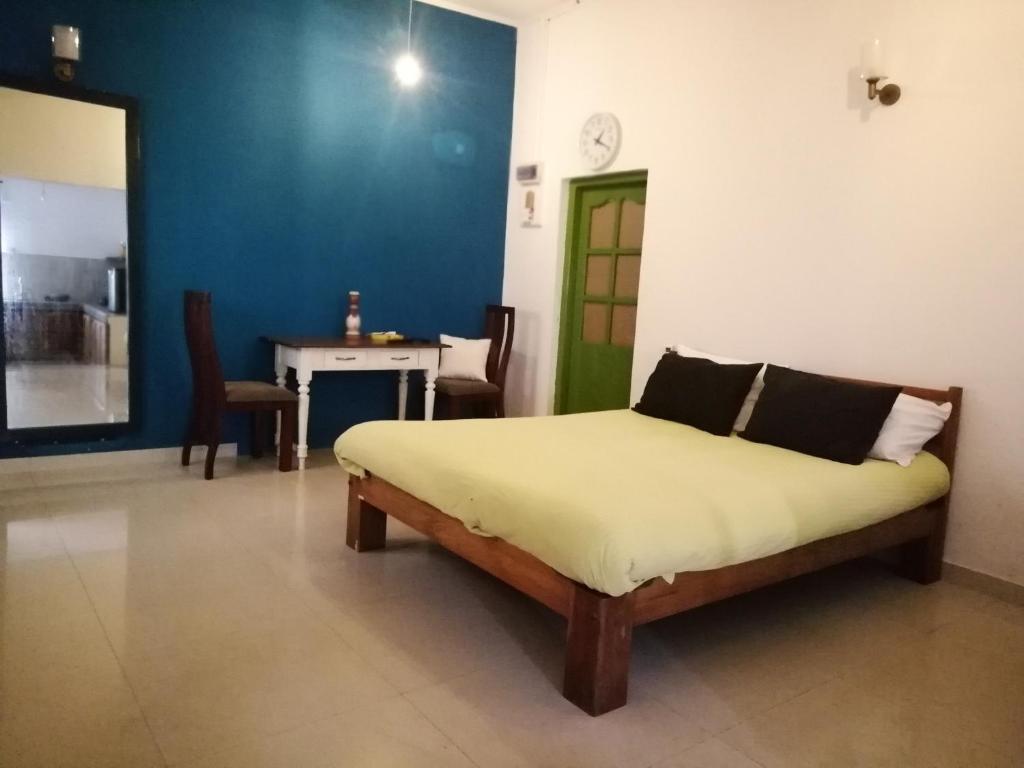 Postel nebo postele na pokoji v ubytování Mitrayu