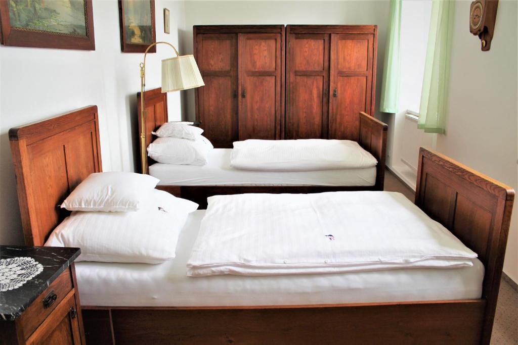 Postel nebo postele na pokoji v ubytování Apartmány PAPÍK