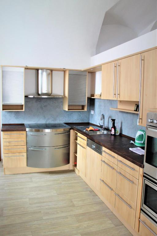 Kuchyň nebo kuchyňský kout v ubytování Apartmány PAPÍK