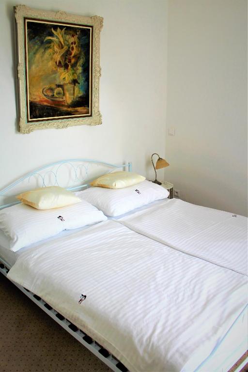 Postel nebo postele na pokoji v ubytování Apartmány PAPÍK