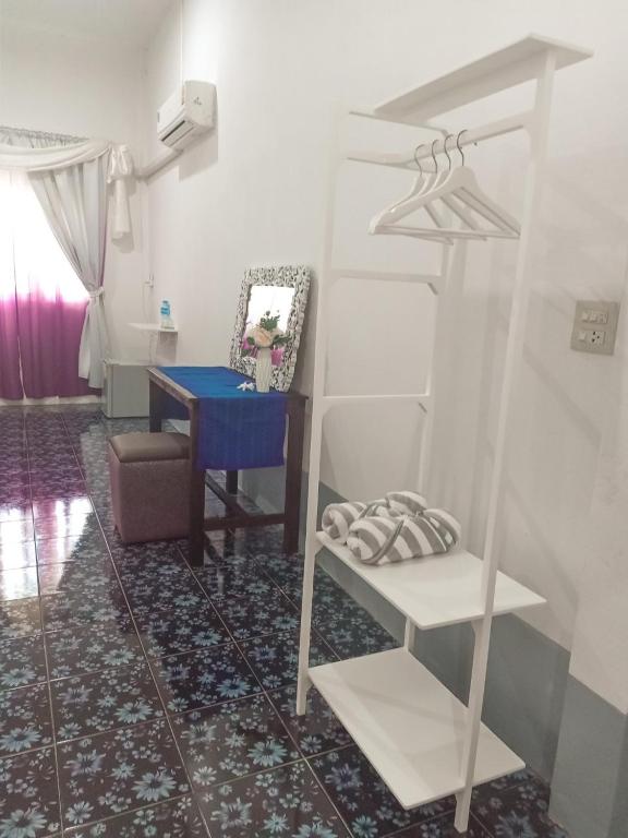 Postel nebo postele na pokoji v ubytování โรสชาเลต์ Rose Chalet