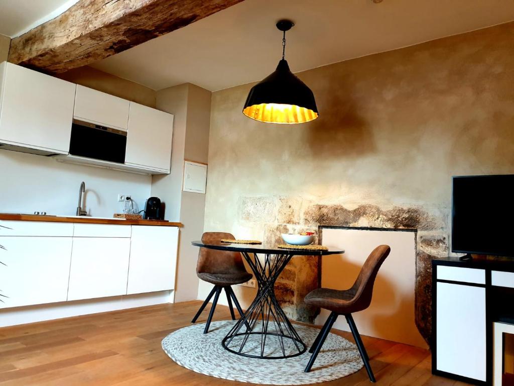 Kuchyň nebo kuchyňský kout v ubytování Restauberge Peitry