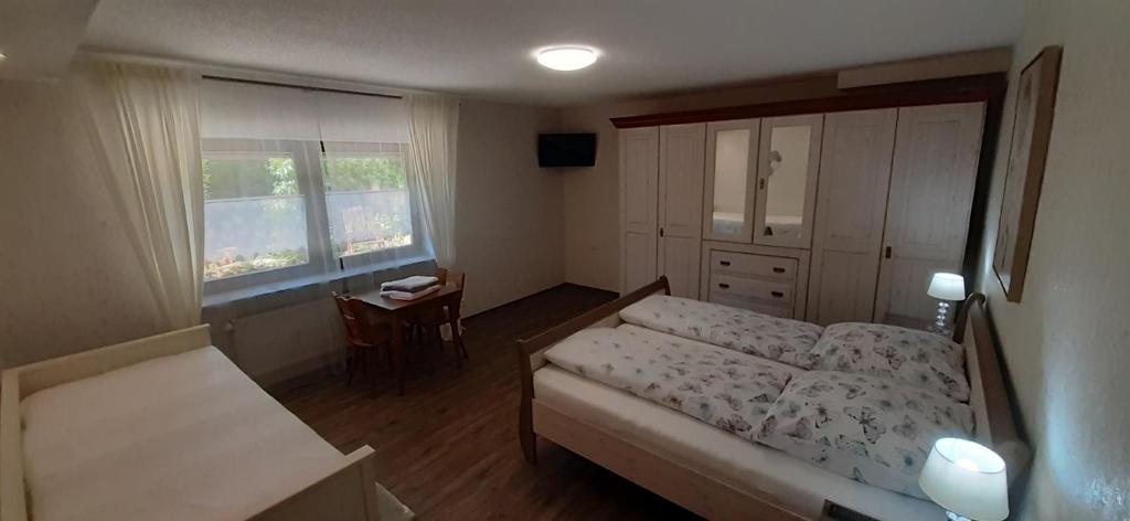 Postel nebo postele na pokoji v ubytování Gästehaus Gerhardt