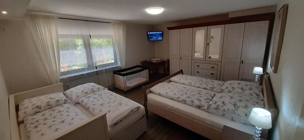 Postel nebo postele na pokoji v ubytování Gästehaus Gerhardt