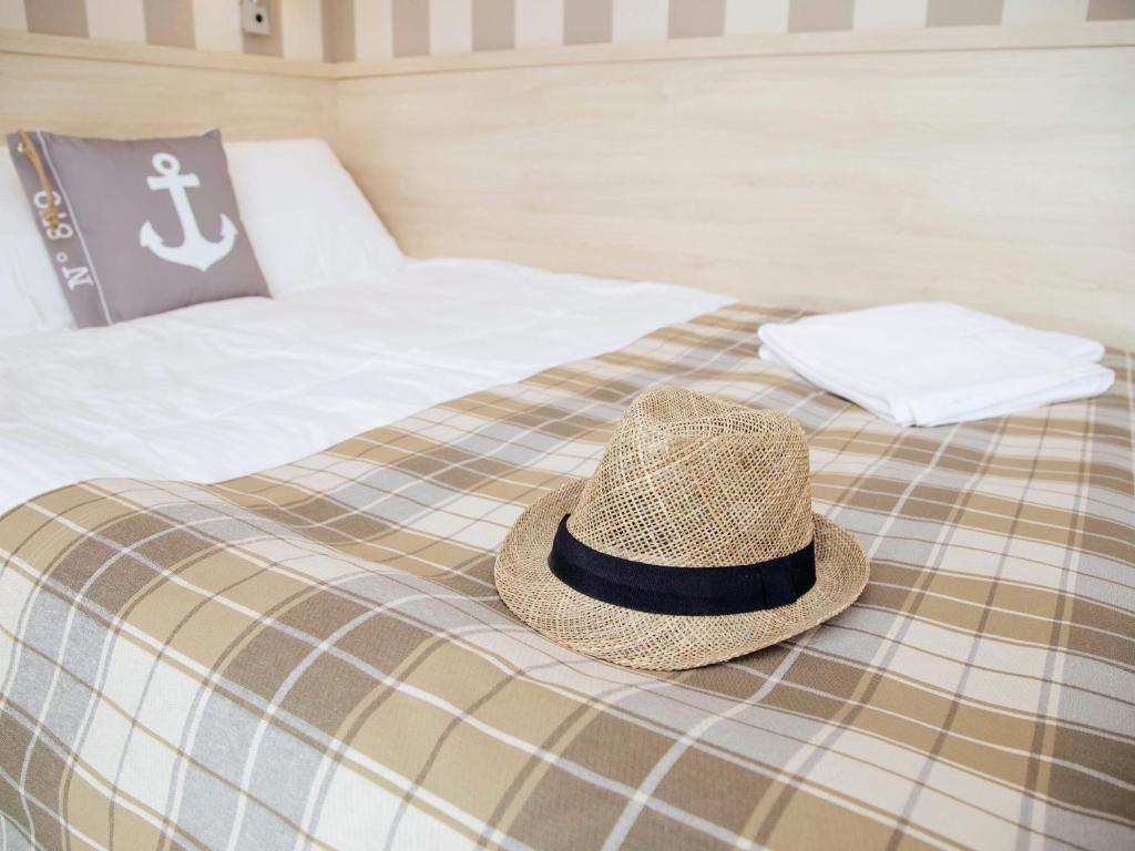 Postel nebo postele na pokoji v ubytování Porto Marina