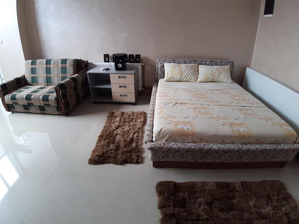 Postel nebo postele na pokoji v ubytování apartman